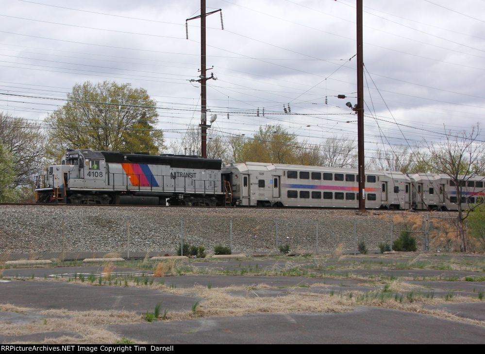 NJT 4108 heads west with a mix of coaches.